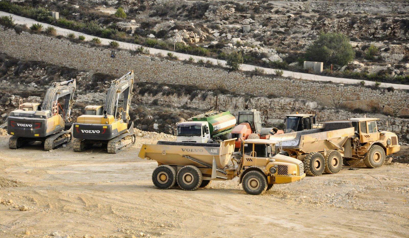 Trucks on the road transporting materials